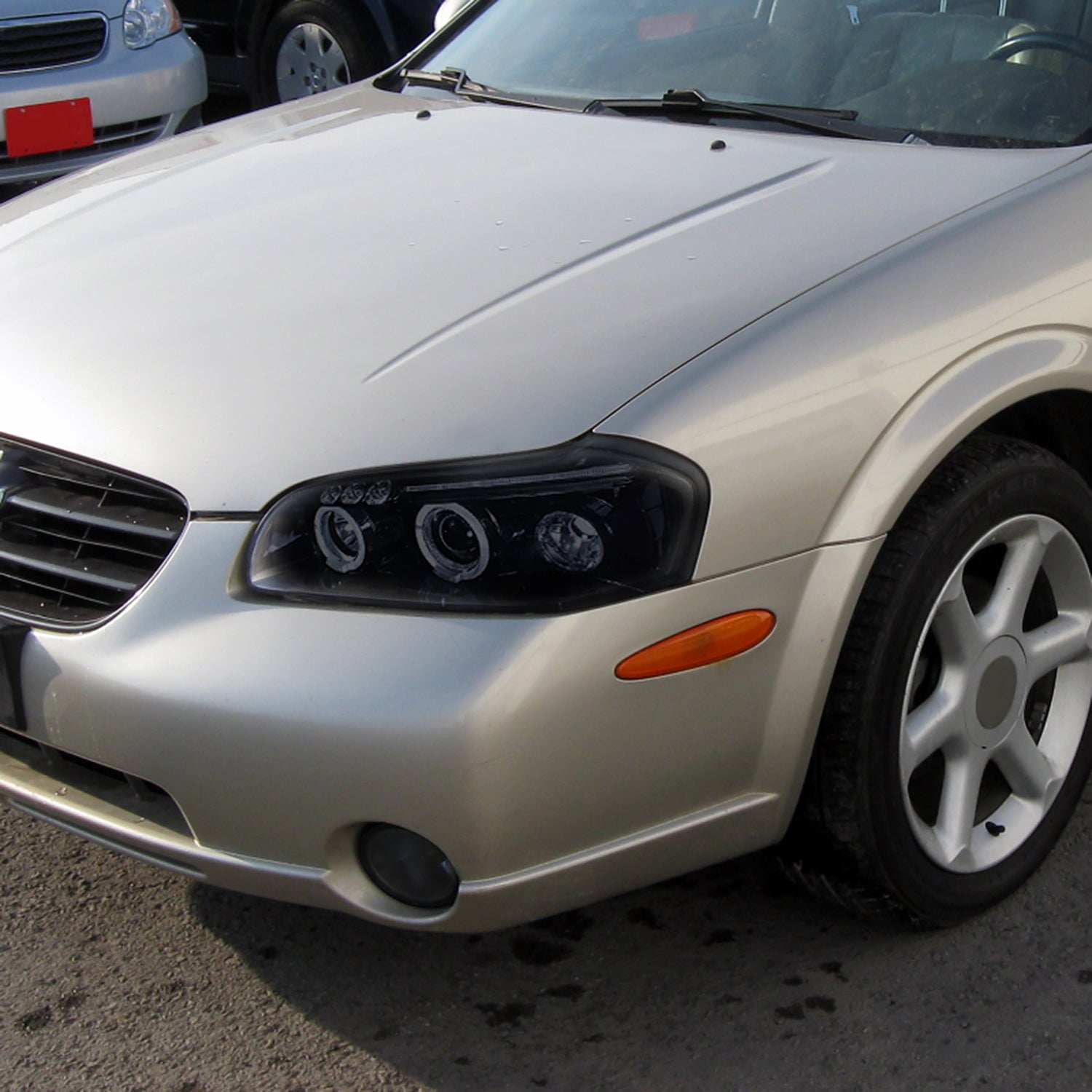 2000-2001 Nissan Maxima Dual Halo Projector Headlights Glossy Black/Smoke Lens