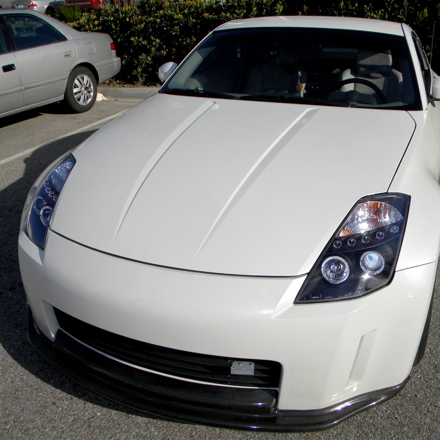 2003-2005 Nissan 350Z Dual Halo Projector Headlights Matte Black/Clear Lens