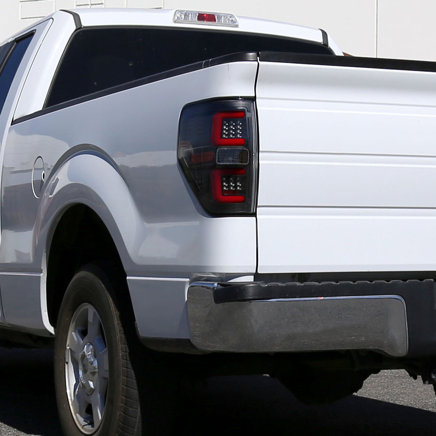 2009-2014 Ford F-150 LED Tail Lights with Red LED Bar Matte Black/Clear Lens