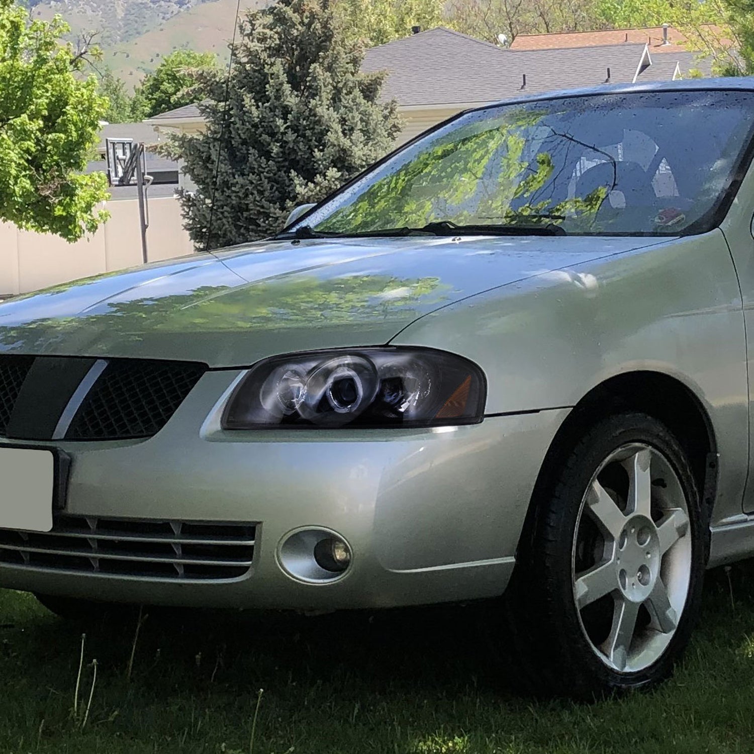 2004-2006 Nissan Sentra Dual Halo Projector Headlights Glossy Black/Smoke Lens