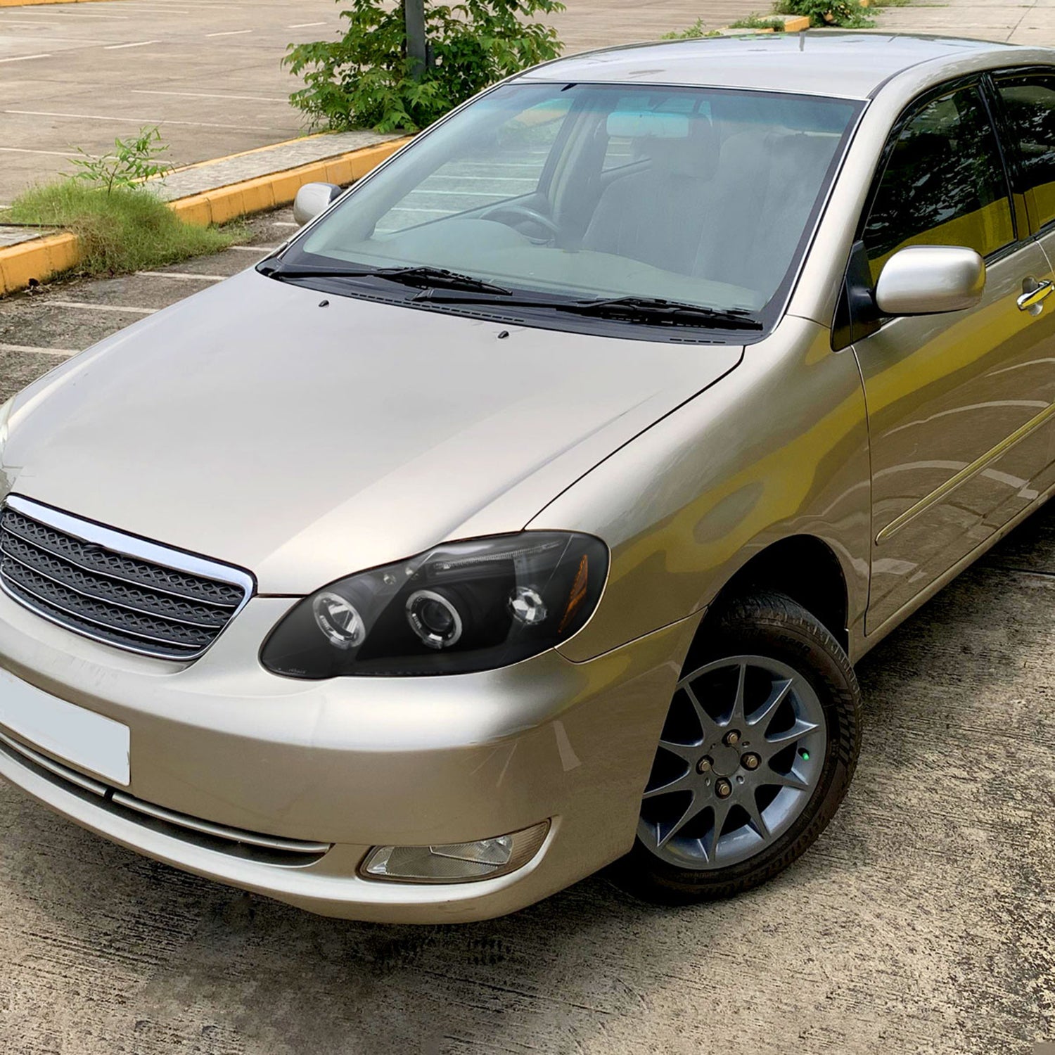 2003-2008 Toyota Corolla Dual Halo Projector Headlights Matte Black/Clear Lens