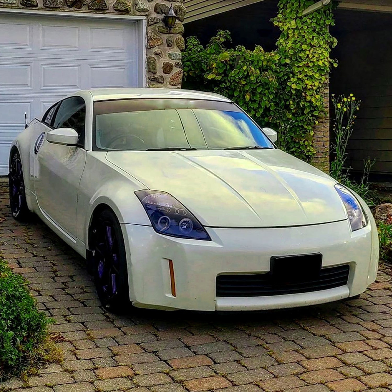 2003-2005 Nissan 350Z Dual Halo Projector Headlights Glossy Black/Smoke Lens