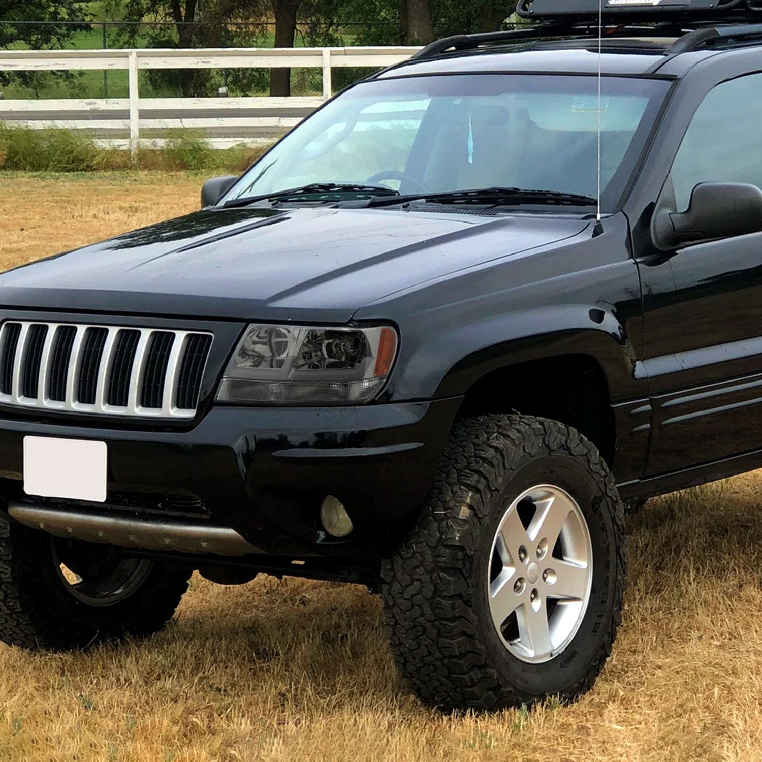 1999-2004 Jeep Grand Cherokee Factory Dual LED Bar Headlights Chrome/Smoke