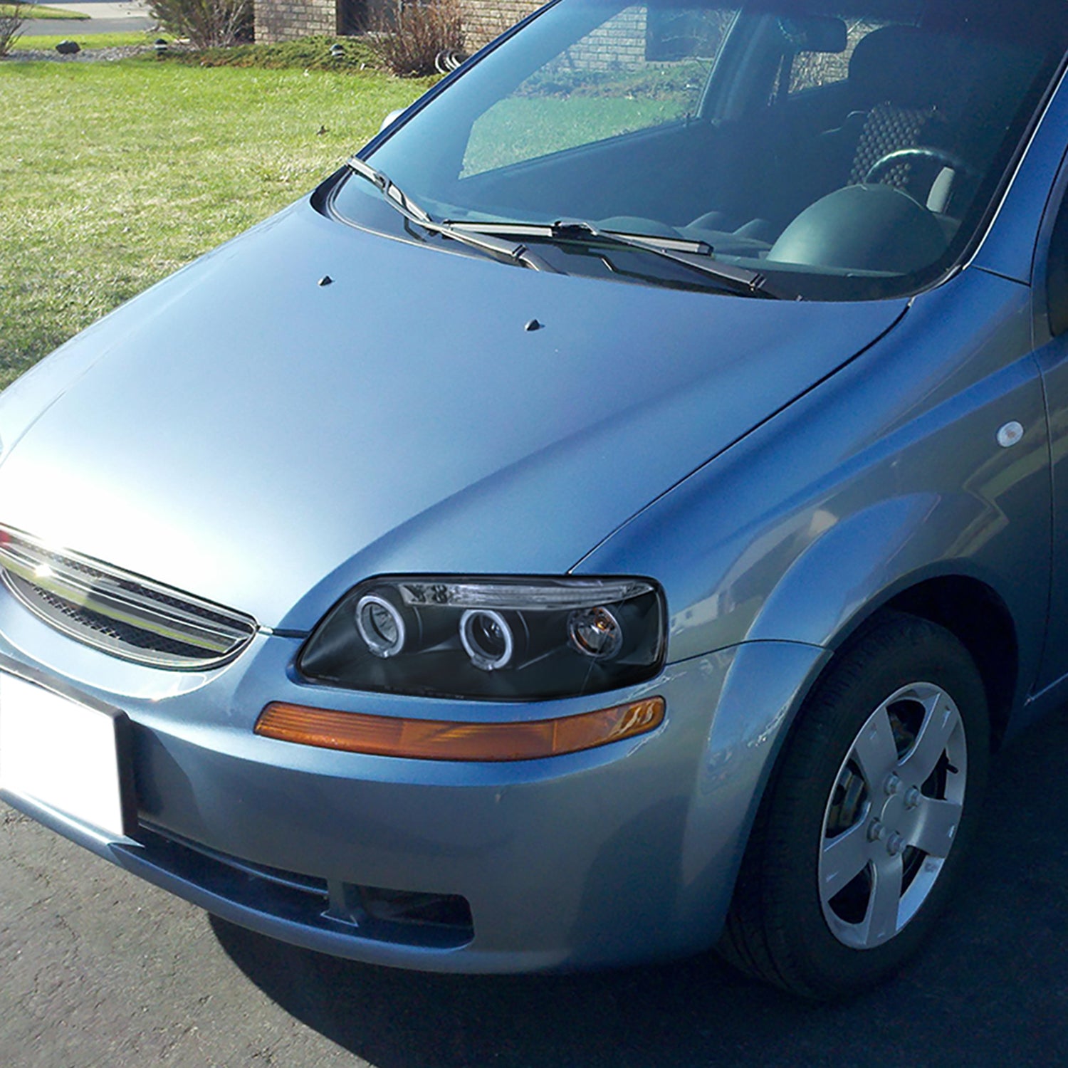 2004-2008 Chevy Aveo Dual Halo Projector Headlights Matte Black/Clear Lens