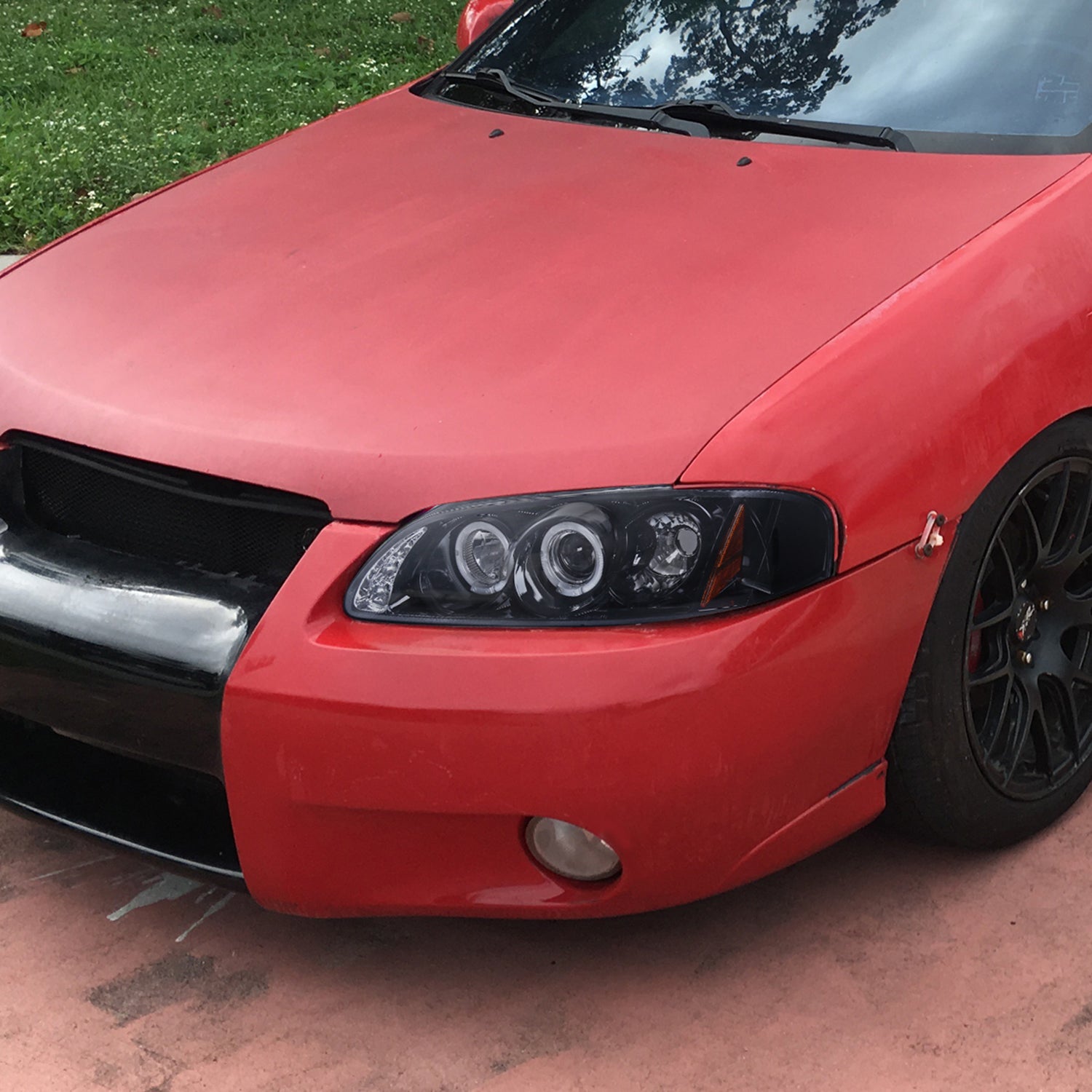 2000-2003 Nissan Sentra Dual Halo Projector Headlights Glossy Black/Smoke Lens