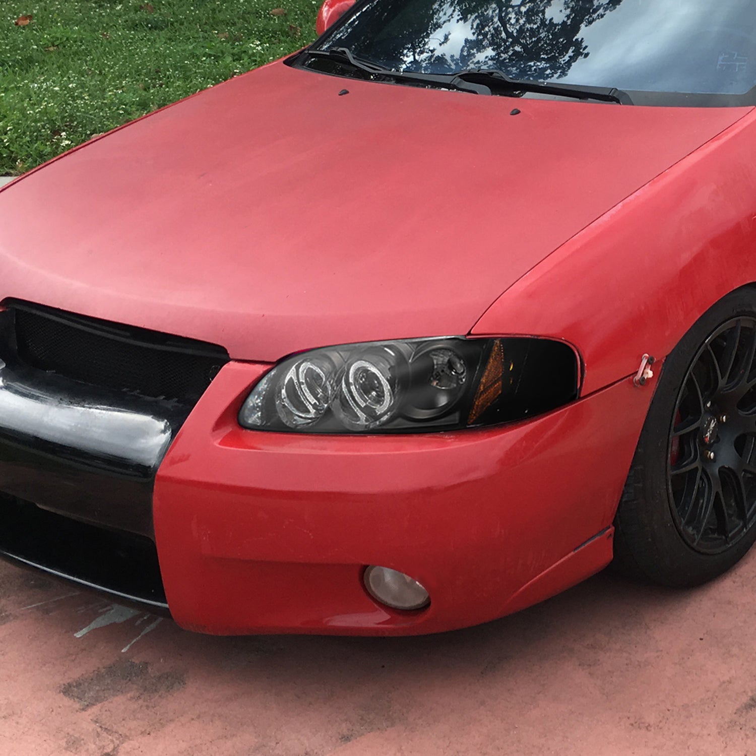2000-2003 Nissan Sentra Dual Halo Projector Headlights Matte Black/Clear Lens
