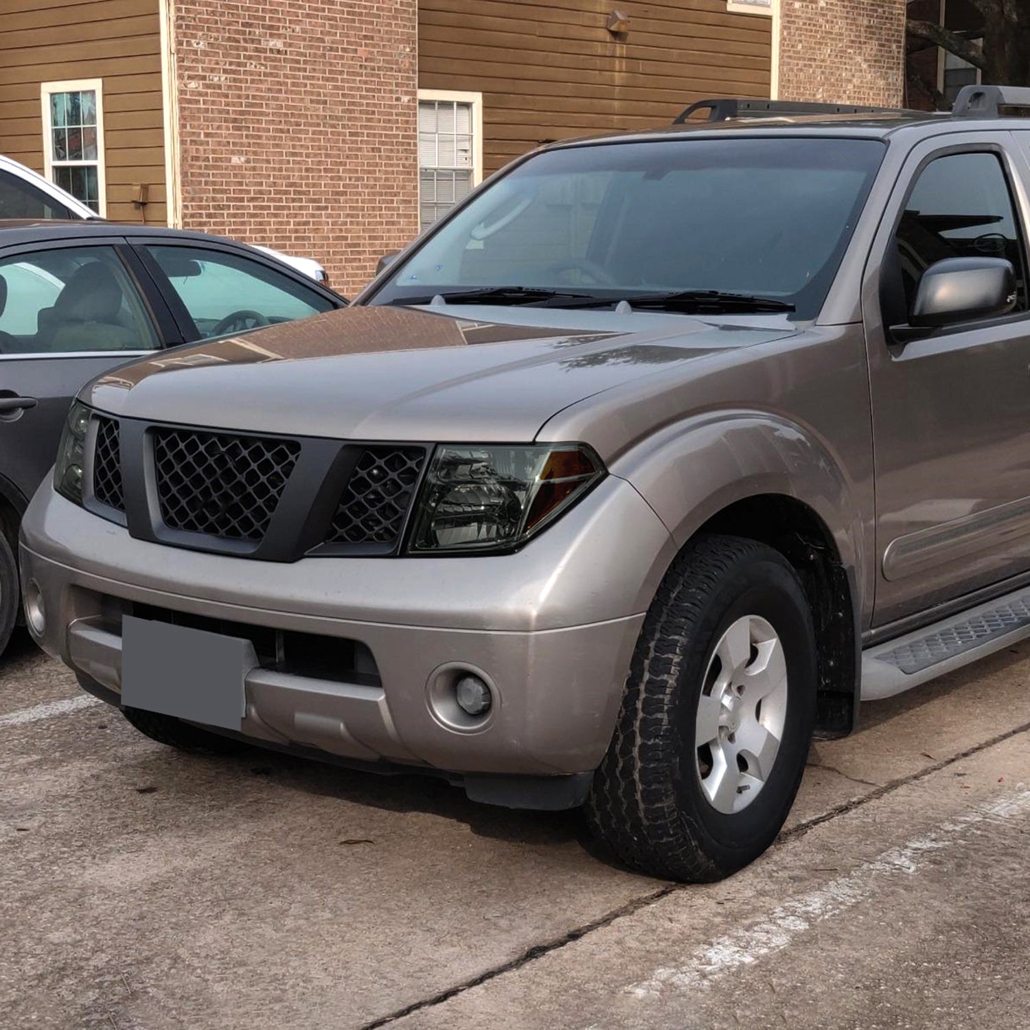 2005-2008 Nissan Frontier/2005-2006 Pathfinder Factory Headlights Chrome/Smoke