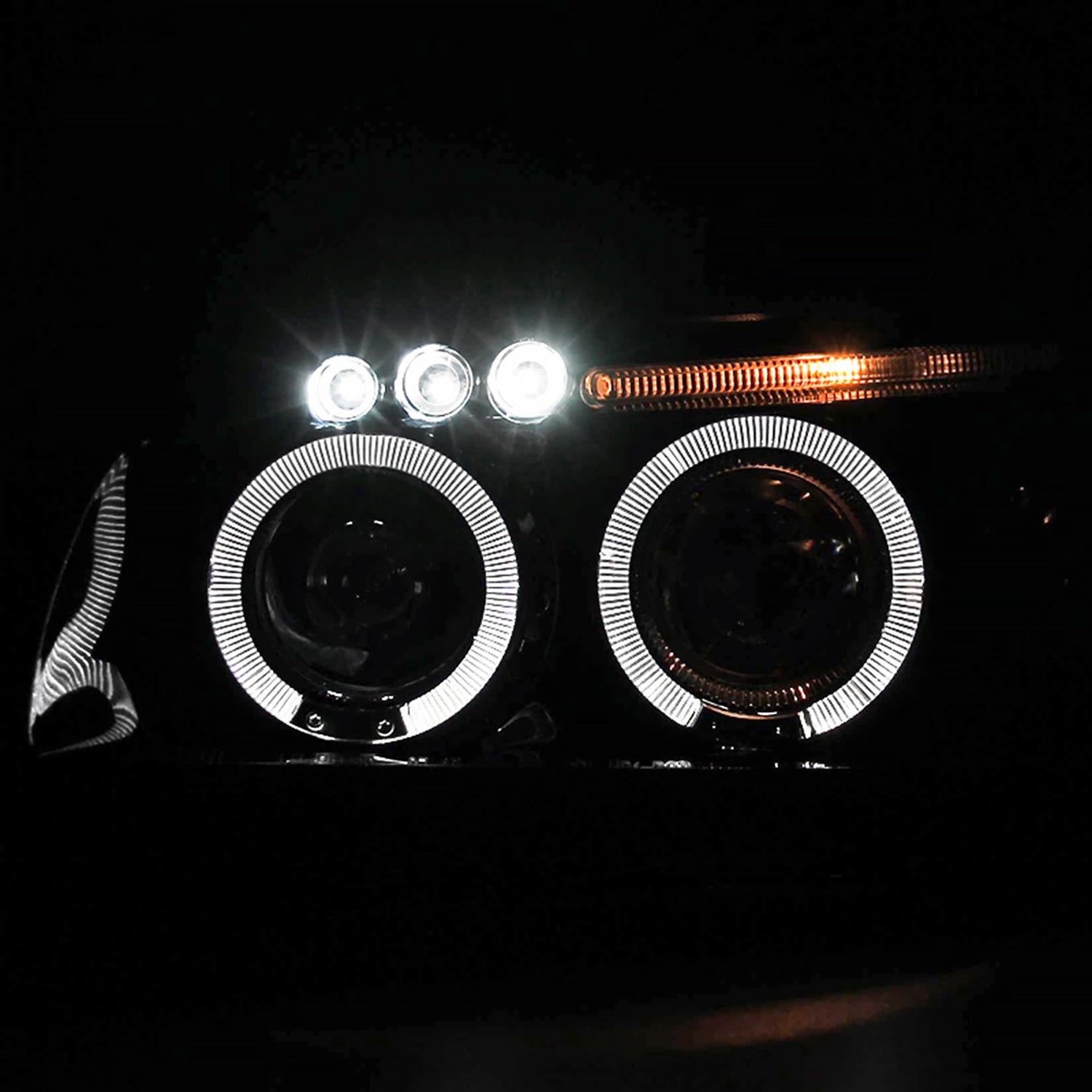 2000-2001 Nissan Maxima Dual Halo Projector Headlights Glossy Black/Smoke Lens