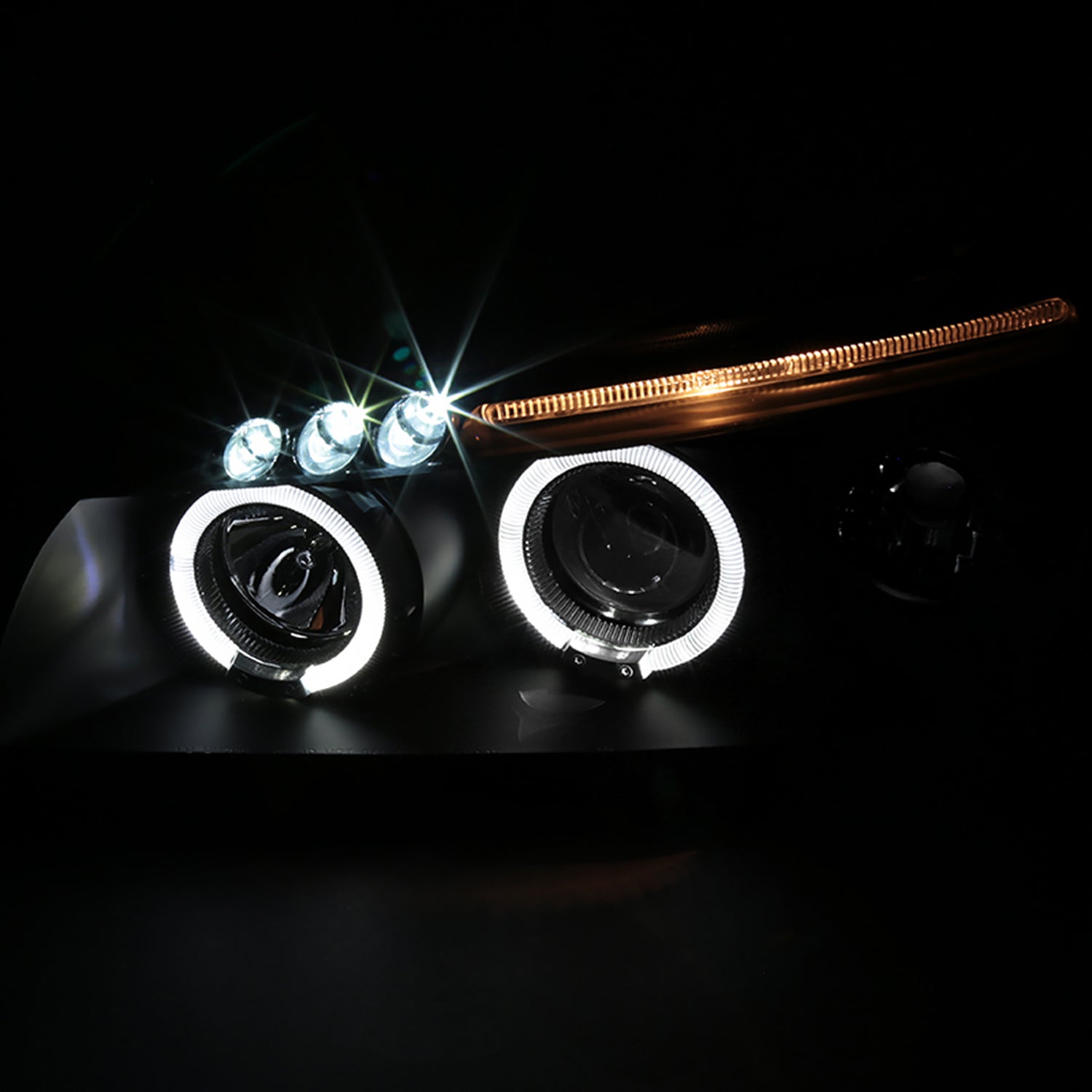 2000-2001 Nissan Maxima Dual Halo Projector Headlights Matte Black/Clear Lens