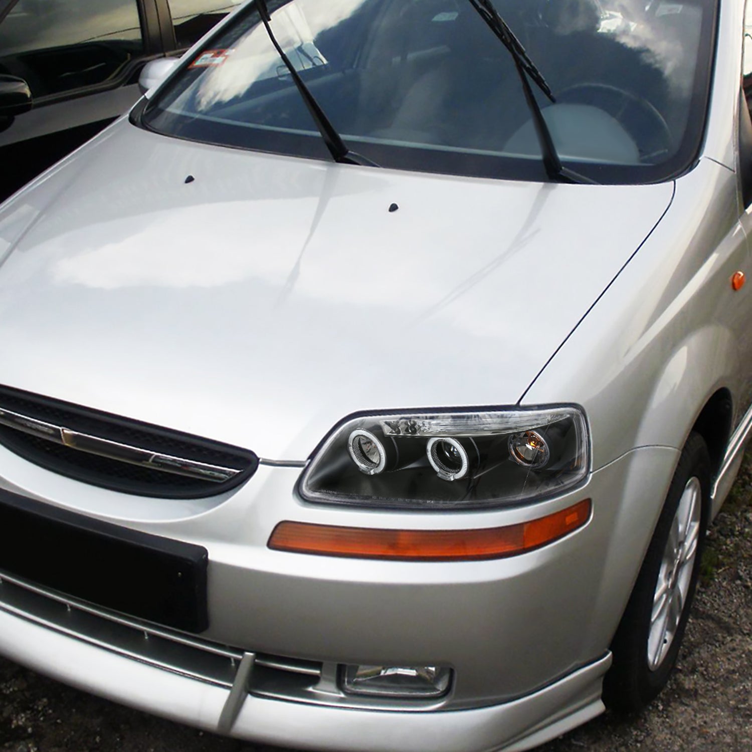 2004-2008 Chevy Aveo Dual Halo Projector Headlights Matte Black/Clear Lens