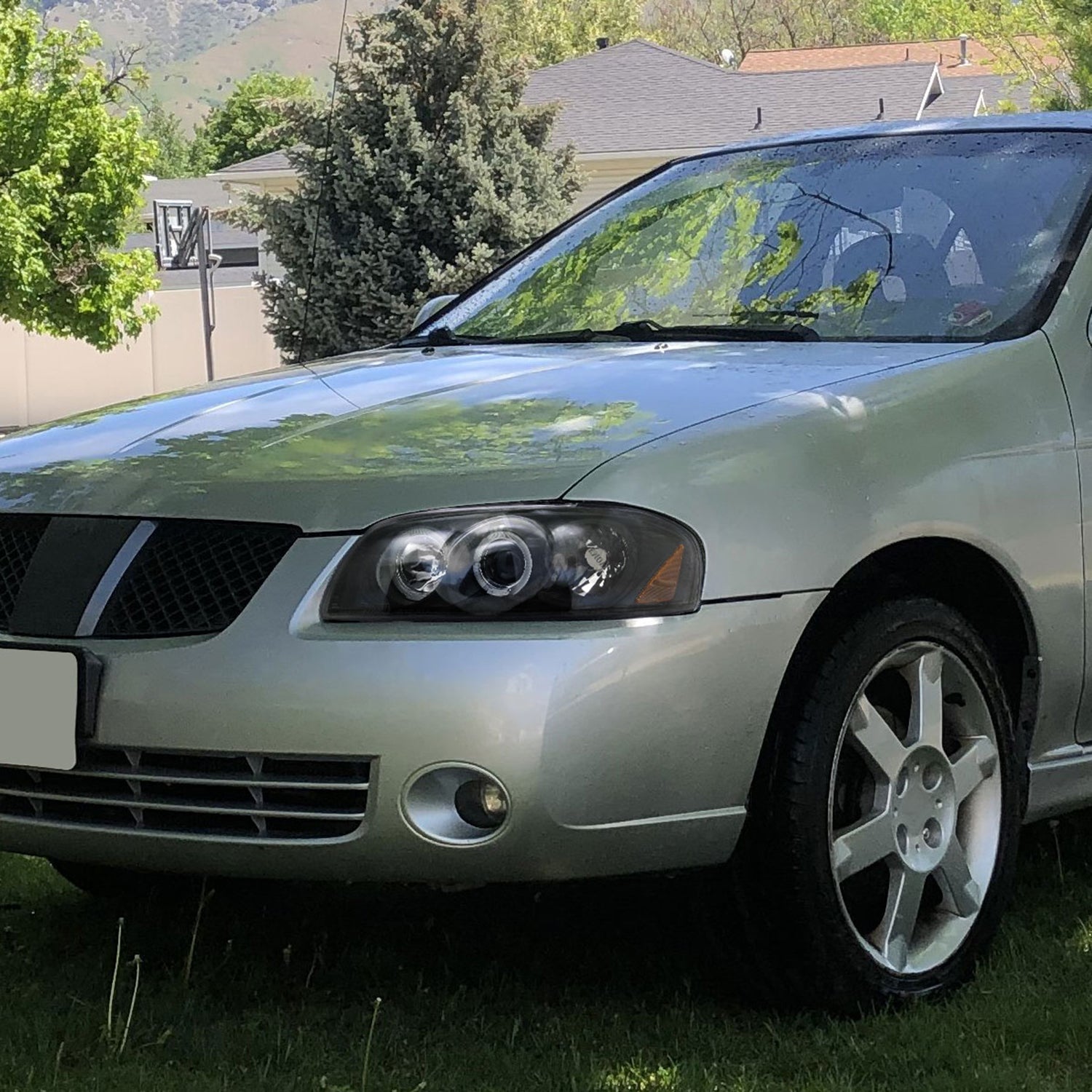 2004-2006 Nissan Sentra Dual Halo Projector Headlights Matte Black/Clear Lens