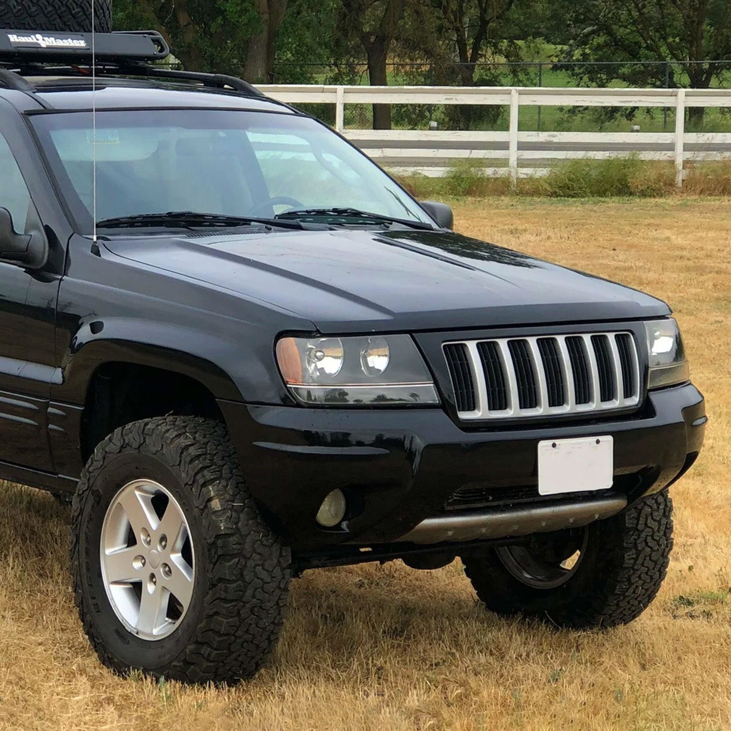 1999-2004 Jeep Grand Cherokee Factory Crystal Headlights Amber & Matte Black