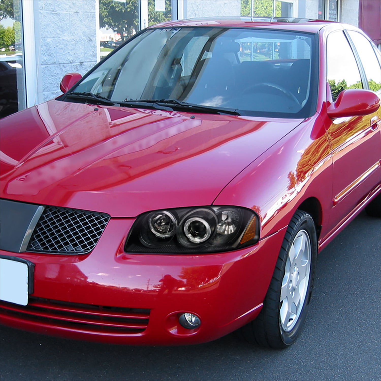 2004-2006 Nissan Sentra Dual Halo Projector Headlights Matte Black/Clear Lens
